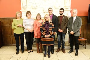 Members of the group from Dudley pose for photos with the Bishop of Dudley Martin Gorick