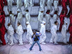 Kendrick Lamar performing in front of dancers at the Super Bowl