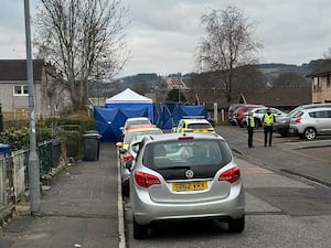 The police cordon and forensic tent on Maree Road, Paisley following an incident in the area on Saturday