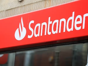 View of a Santander sign above a branch in Nottingham City Centre.