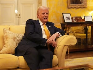 Donald Trump on a sofa in the Oval Office