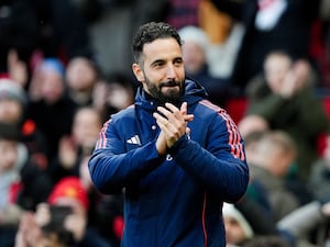 Ruben Amorim applauds at Old Trafford