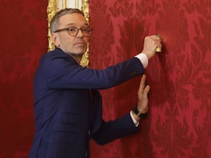 Austria’s Freedom Party leader Herbert Kickl leaves the presidential office, in Vienna