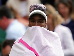 Venus Williams under a towel