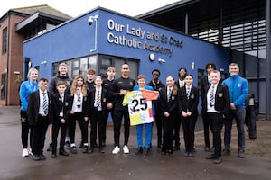 Community Captain Louisa Craig is pictured with Karl Henry and staff and students from Our Lady & St Chad Catholic Academy.