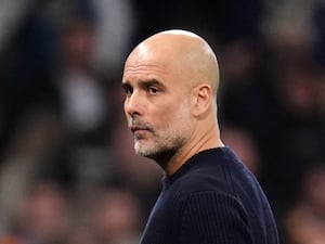 Manchester City manager Pep Guardiola walks off the field after Manchester City's loss to Real Madrid