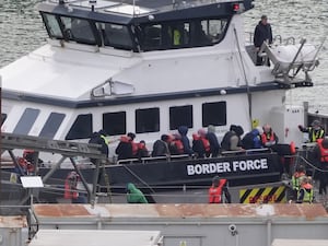 Migrants arriving in the UK after crossing the Channel