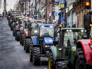 Members of the Ulster Farmers Union take part in a protest on the streets of Londonderry