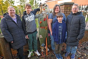 Friends of Heath Hayes Park chairperson Jane Johns, Aaron Johns, Stephanie and Mark Nicklas and Adele Johns pictured with one of the straw creations