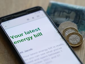 A smartphone showing a customer's energy bill