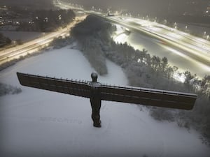 Snow surrounds the Angel of the North in Gateshead, Tyne and Wear