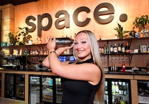 Bartender Bethany Harrison is one of the friendly faces when customers walk in