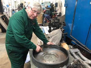 Senior Engineer Ian Stanfield shows crack in rear brake drum