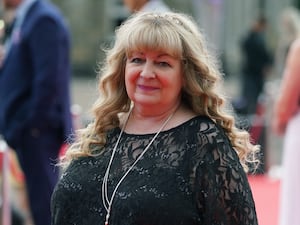 Headshot of Janey Godley smiling