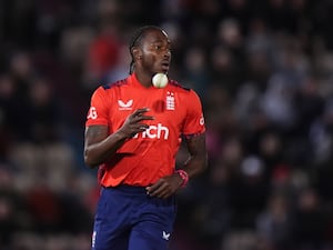 Jofra Archer throws the ball up during an England T20