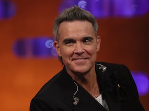 Robbie Williams appearing on the Graham Norton show