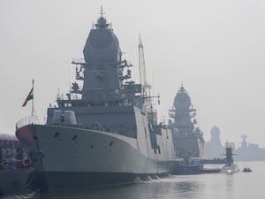 INS Nilgiri, left, along with Submarine Vaghsheer, right, and INS Surat