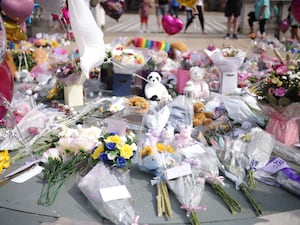 Flowers and tributes outside the Atkinson Art Centre Southport, after three children were fatally stabbed