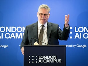 Sir Keir Starmer gesticulates as he delivers a speech at Google's London AI Campus