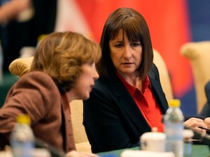 Rachel Reeves confers with the British ambassador to China during a meeting in Beijing