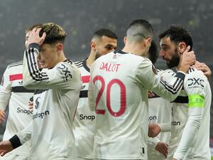 Manchester United players celebrate scoring