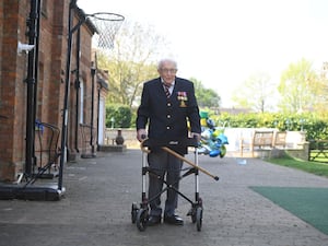 Captain Sir Tom Moore walking laps in his garden