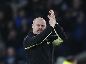 Sean Dyche applauds the fans