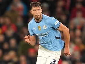 Ruben Dias in possession during a Manchester City game