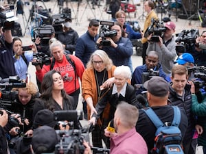 Erik and Lyle Menendez’s aunt Joan VanderMolen, centre, arrives to attend a hearing at the Van Nuys courthouse in Los Angeles