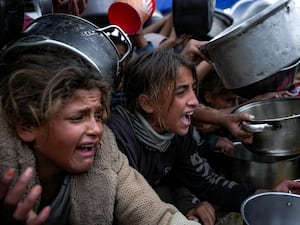 Palestinian girls at a food distribution centre