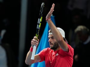 Jacob Fearnley applauds after beating Arthur Cazaux