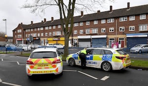 Officers in Redwood Road on Thursday morning