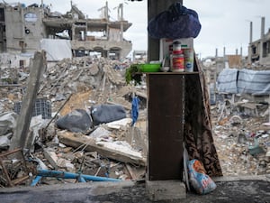 Destroyed walls expose the devastation outside the Odeh house in the Jabaliya refugee camp in the northern Gaza Strip