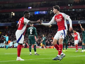 Kai Havertz celebrates with team-mate Bukayo Saka