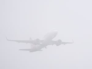 A plane in the fog