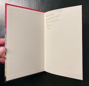 Katie's pristine hardback first edition of Harry Potter and the Philospher's stone with the signature inside. Photo: Rare Book Auctions