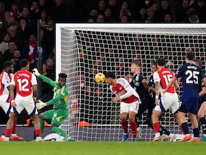 William Saliba diverts the ball in from a corner