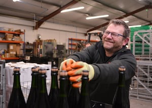 Jason Willetts on the bottling line at Halfpenny Green Wine Estate on Tuesday, February 4, 2025.