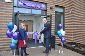 Headteacher Kate Bryant and Director General of Regions Group for the Department for Education, John Edwards cut the ribbon of the new school.