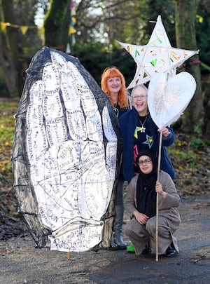 The Butts Lantern Trail, which happens on December 8. Pictured are Deb Slade, Alidon Maxam and Jamilla Fazal, with some of the lanterns.