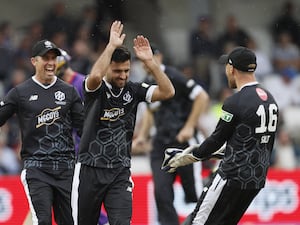 Manchester Originals players celebrate a wicket in The Hundred.