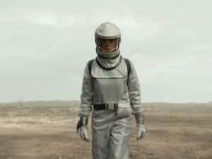 Rebecca Ferguson wearing a spacesuit in Silo