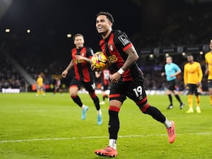 Bournemouth’s Justin Kluivert celebrates completing a hat-trick of penalties against Wolves