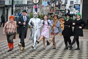 Halesowen Town Centre, where Startime Variety were plugging their upcoming production of: The Wizard of Oz. Pock (orange hair) is: Lisa Whitehouse,  The Wizard (in top hat) is Chris Ashford, Tinman: Holly Mills, Dorothy: Georgina Philpott, Scarecrow: Sara Aldridge, The Witch with the lion for today only: Gemma Shaw and Rowan Shaw, Jade : Madison Meese.