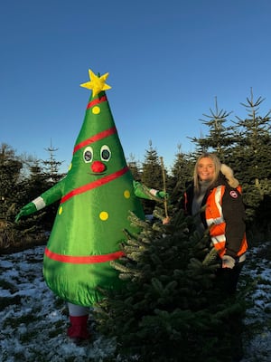 Olivia Silk with St Giles Hospice TreeCycle mascot, Spruce! 