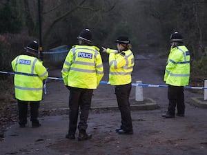 Police officers at the scene near Scribers Lane in the Hall Green area of Birmingham