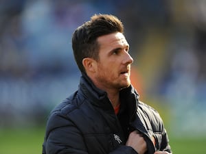 Barry Ferguson looks on