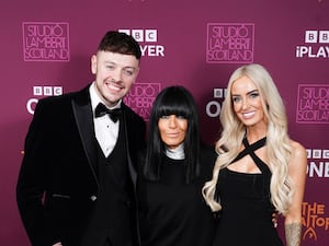 Host Claudia Winkleman (centre) with the two winners of the 2025 series of The Traitors, project manager Jake Brown and former soldier Leanne Quigley