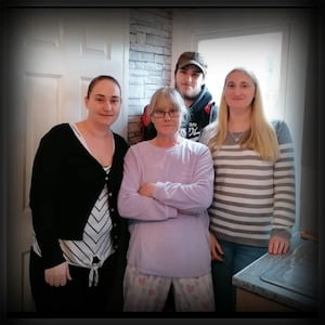 Callum with sister Katie (left), mum, Dawn (middle) and sister Zoe (right)