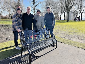 (L-R) Councillor Wayne Little, Shane Birch-Bastock, Frank Chamberlain and Councillor Adam Davies with one of the newly installed WW2 benches